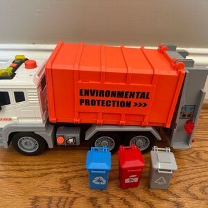 Environmental protection trash truck with bins